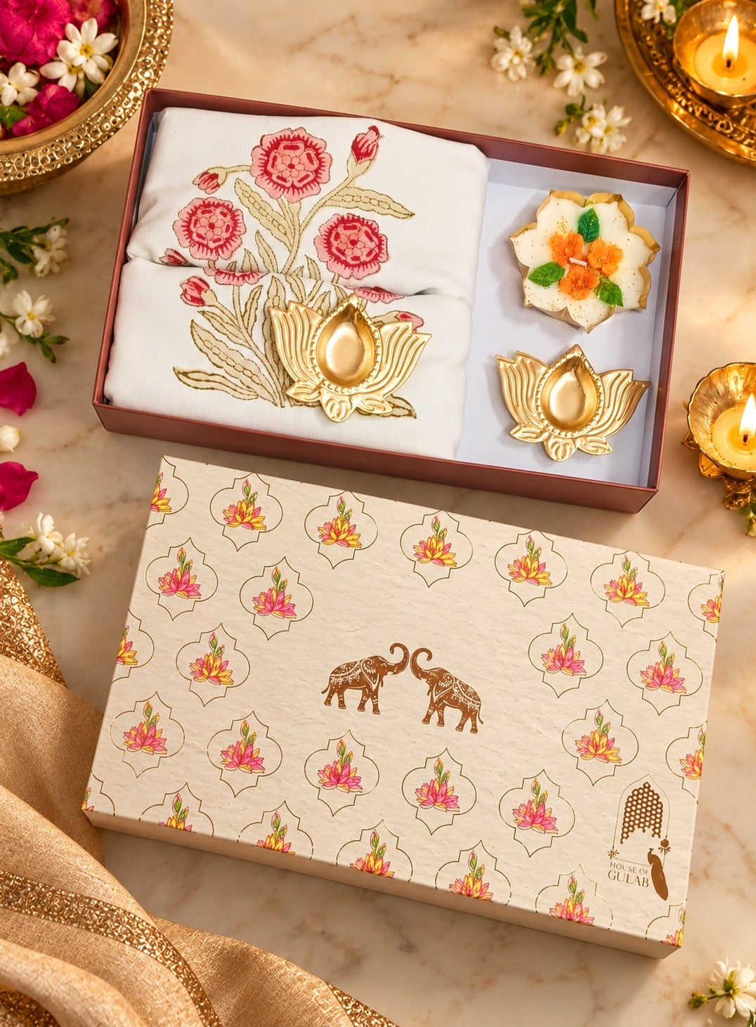 Diwali Home Décor Gift Box with 2 Cushion Covers, 1Handmade Floral Soy Wax Candle & 2 Metal Diyas