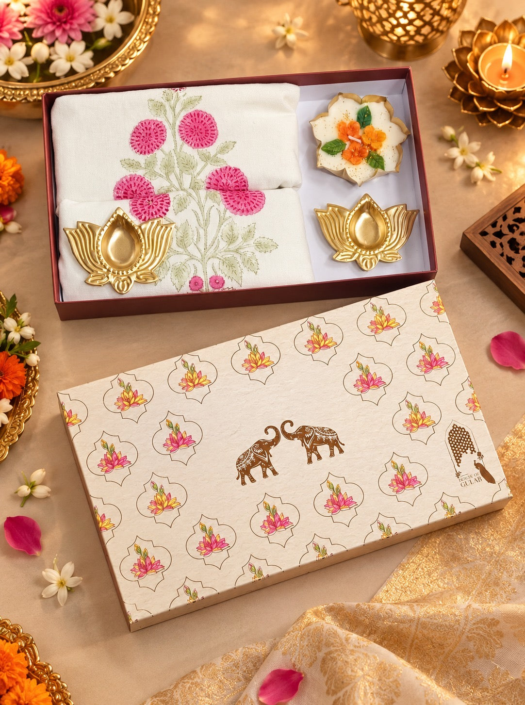 Diwali Home Décor Gift Box with 2 Cushion Covers, 1Handmade Floral Soy Wax Candle & 2 Metal Diyas