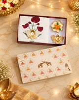 Diwali Home Décor Gift Box with 2 Cushion Covers, 1Handmade Floral Soy Wax Candle & 2 Metal Diyas