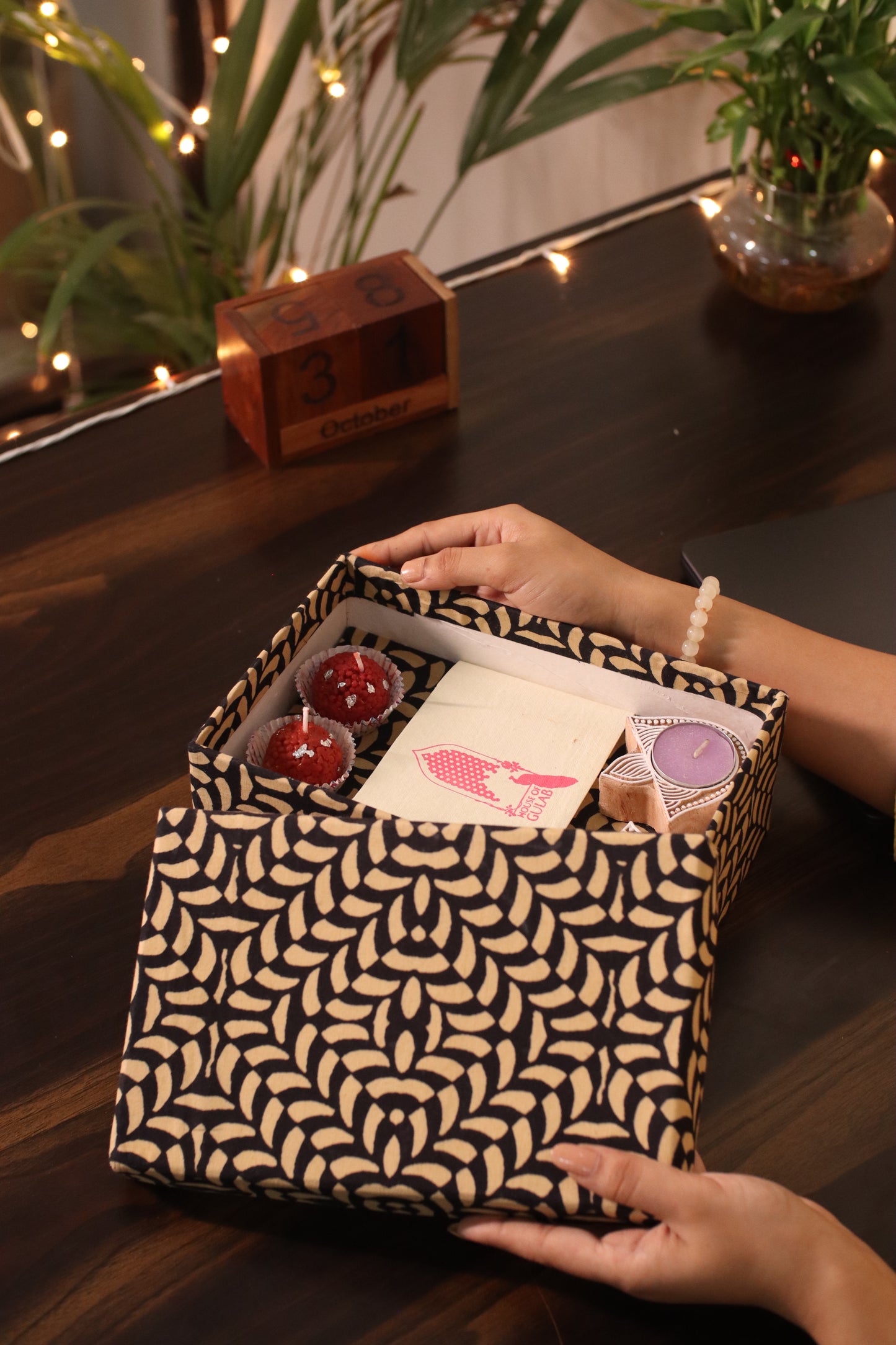 Gift Box with Work Desk Essential : 1 Diary, 1 Notepad, 1 Photoframe, 2 laddoo candles, 2 handblock candles