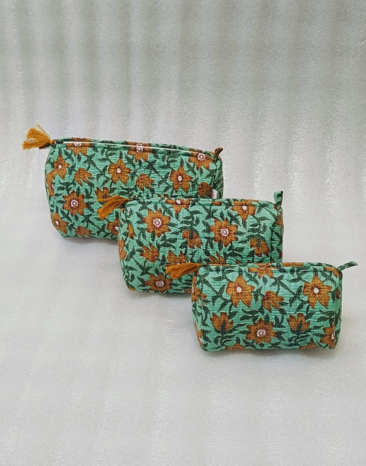 Set of 3 cosmetic bag/pouches with waterproof lining