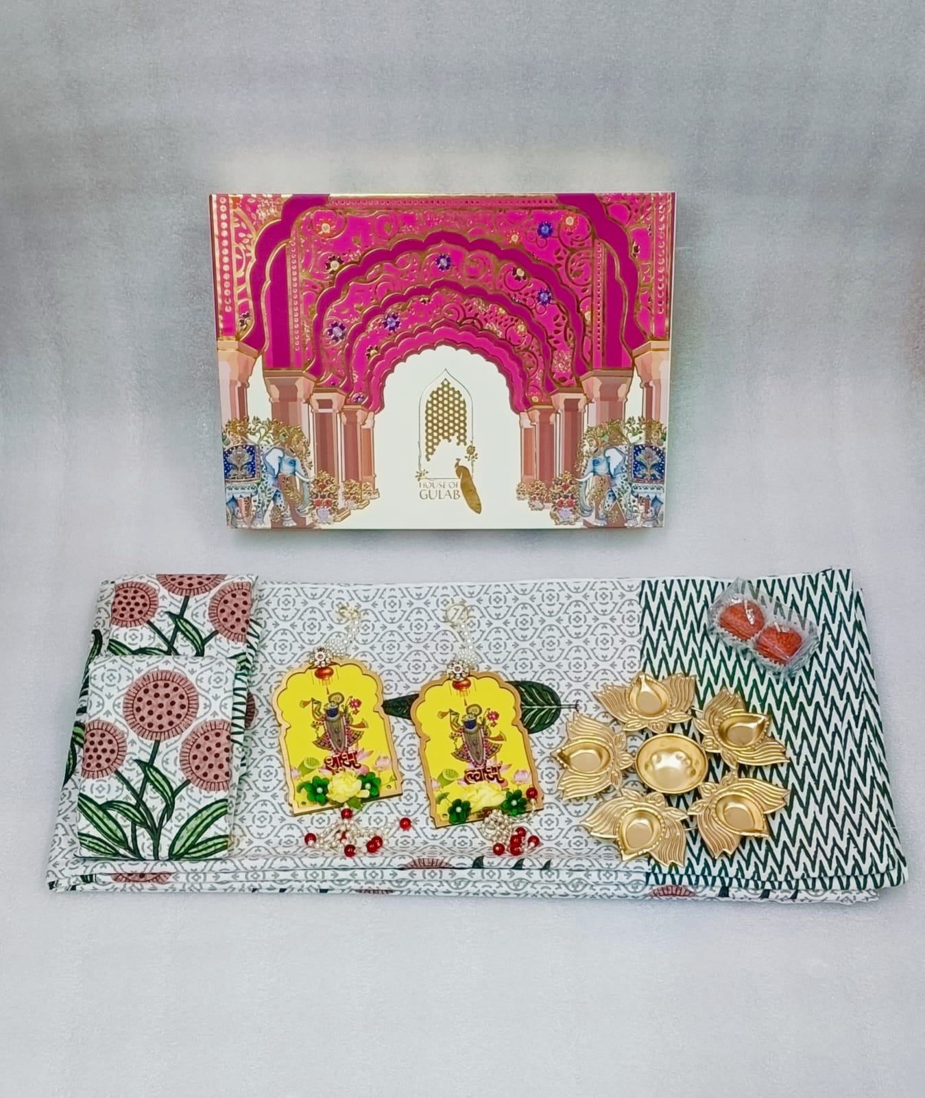 Diwali Gift Box | 1 Double Bedsheet, 1 Pair Door Hanging, 1 Metal Urli, 2 Laddoo Candles
