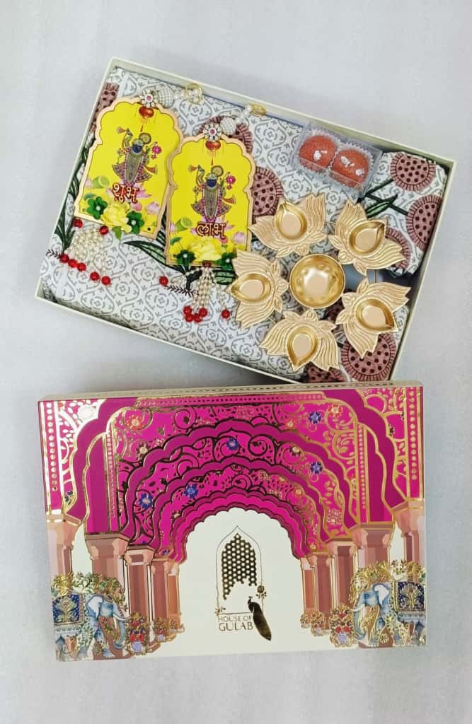 Diwali Gift Box | 1 Double Bedsheet, 1 Pair Door Hanging, 1 Metal Urli, 2 Laddoo Candles