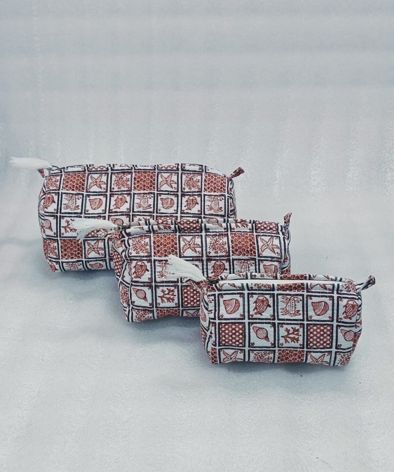 Set of 3 cosmetic bag/pouches with waterproof lining