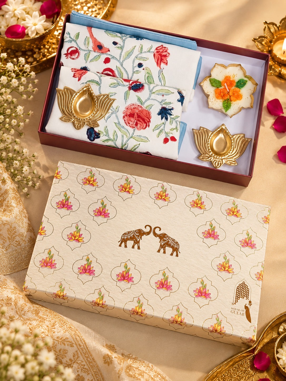 Diwali Home Décor Gift Box with 2 Cushion Covers, 1Handmade Floral Soy Wax Candle & 2 Metal Diyas