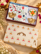 Diwali Home Décor Gift Box with 2 Cushion Covers, 1Handmade Floral Soy Wax Candle & 2 Metal Diyas