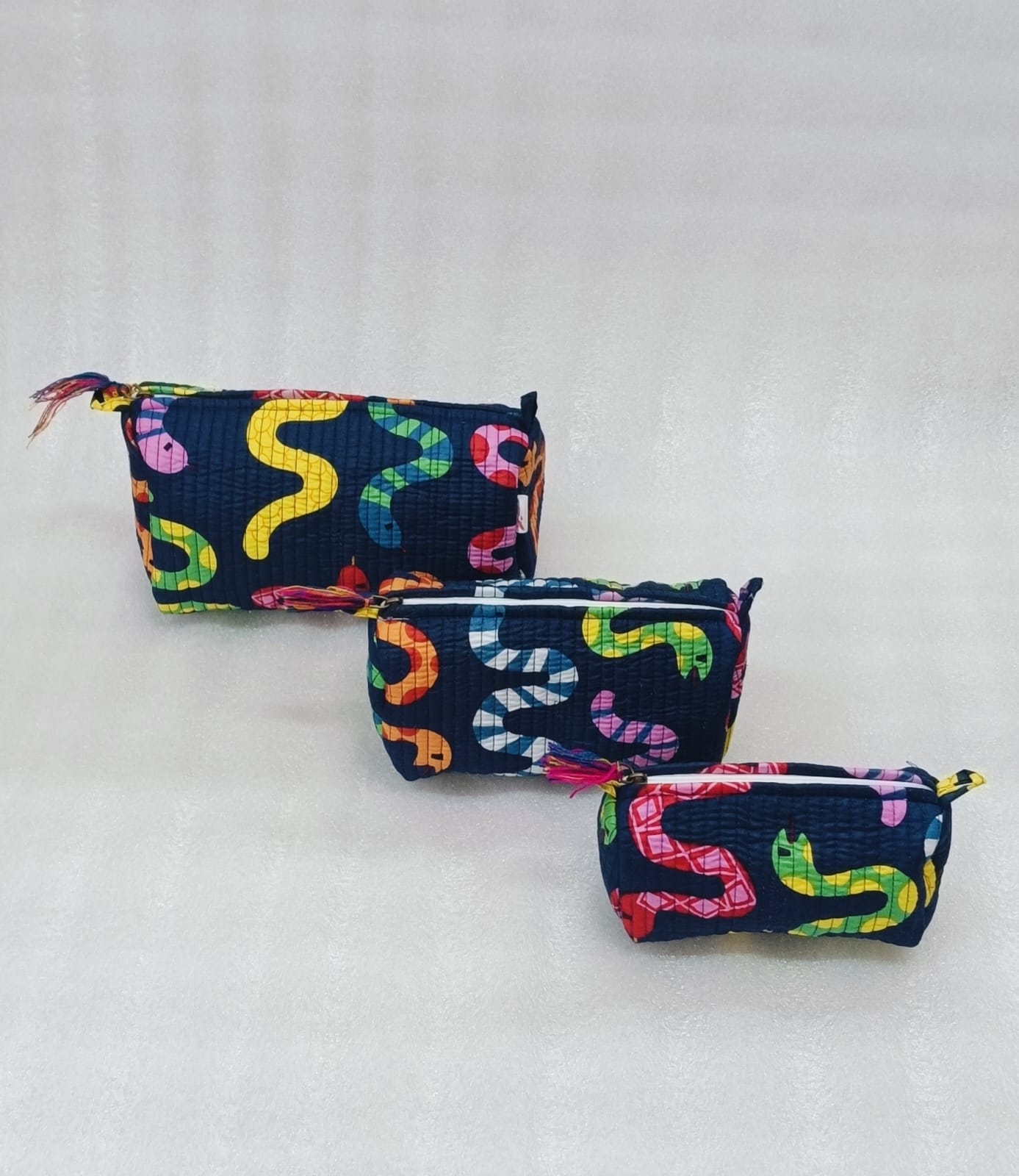 Set of 3 cosmetic bag/pouches with waterproof lining