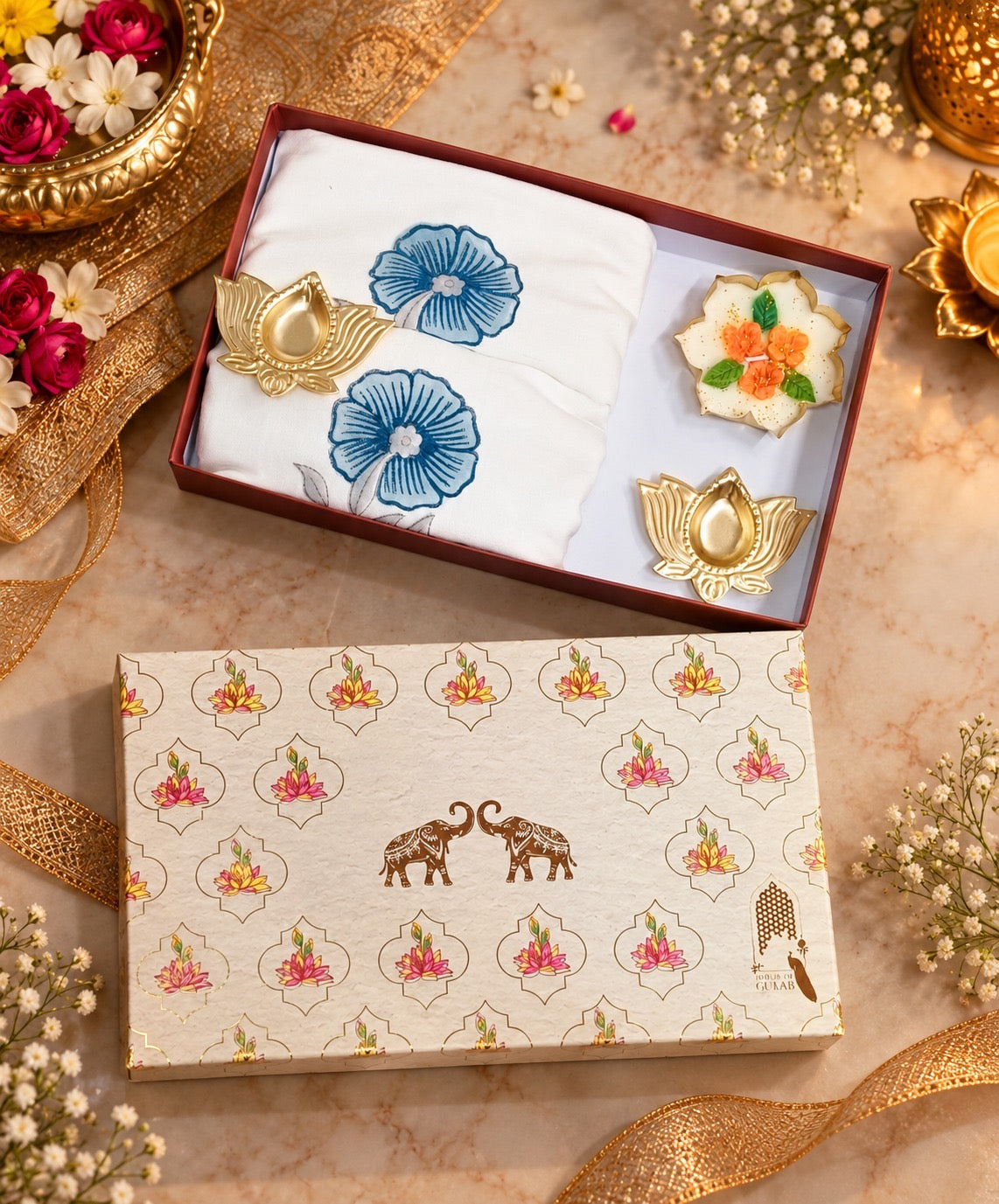 Diwali Home Décor Gift Box with 2 Cushion Covers, 1Handmade Floral Soy Wax Candle & 2 Metal Diyas