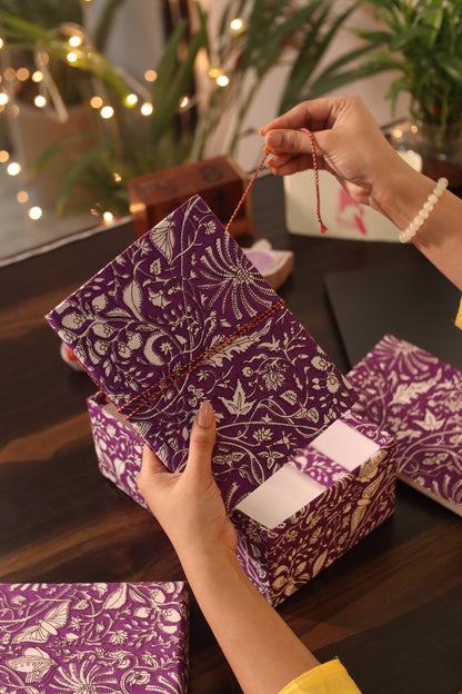 Gift Box with Work Desk Essential : 1 Diary, 1 Notepad, 1 Photoframe, 2 laddoo candles, 2 handblock candles