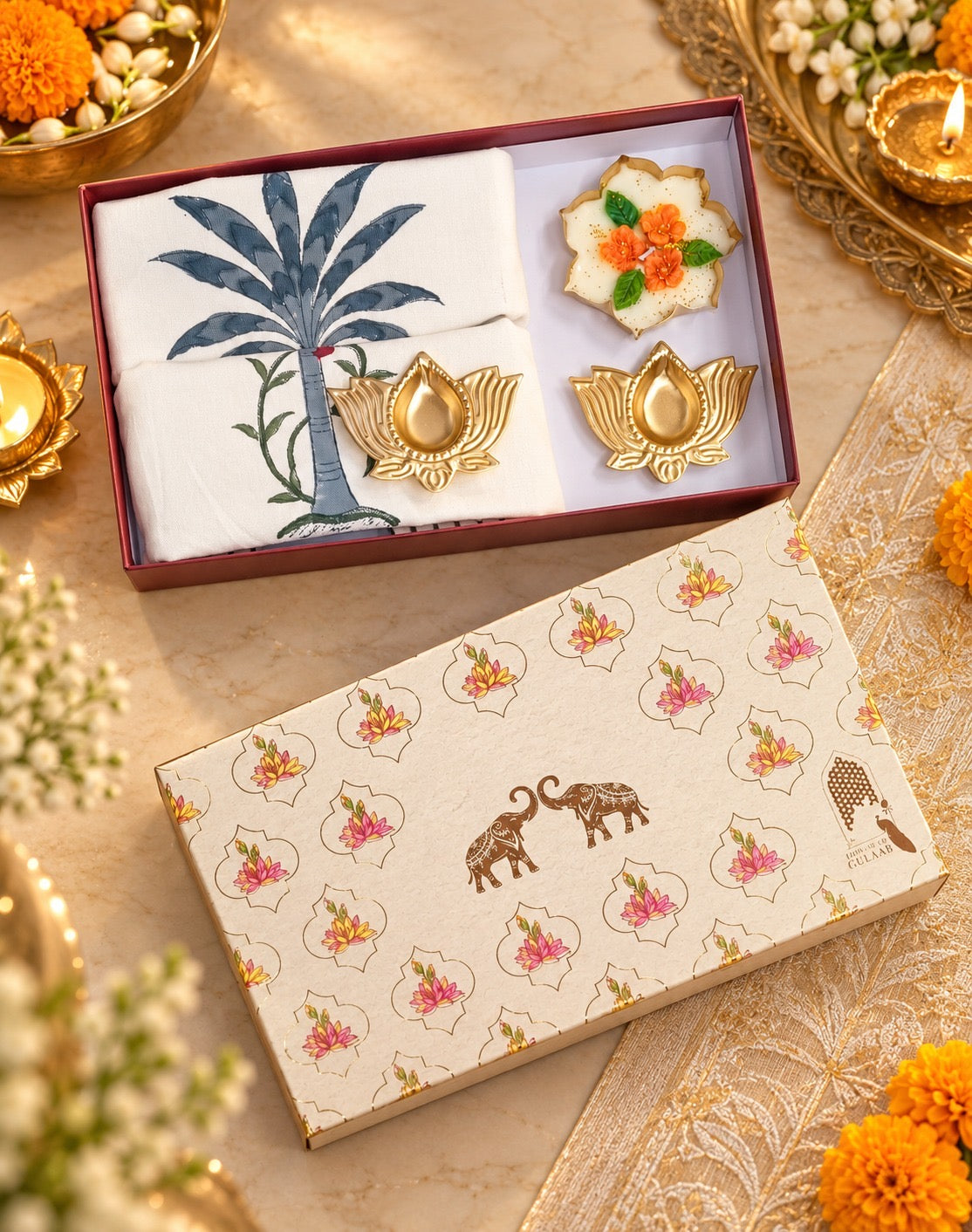 Diwali Home Décor Gift Box with 2 Cushion Covers, 1Handmade Floral Soy Wax Candle & 2 Metal Diyas