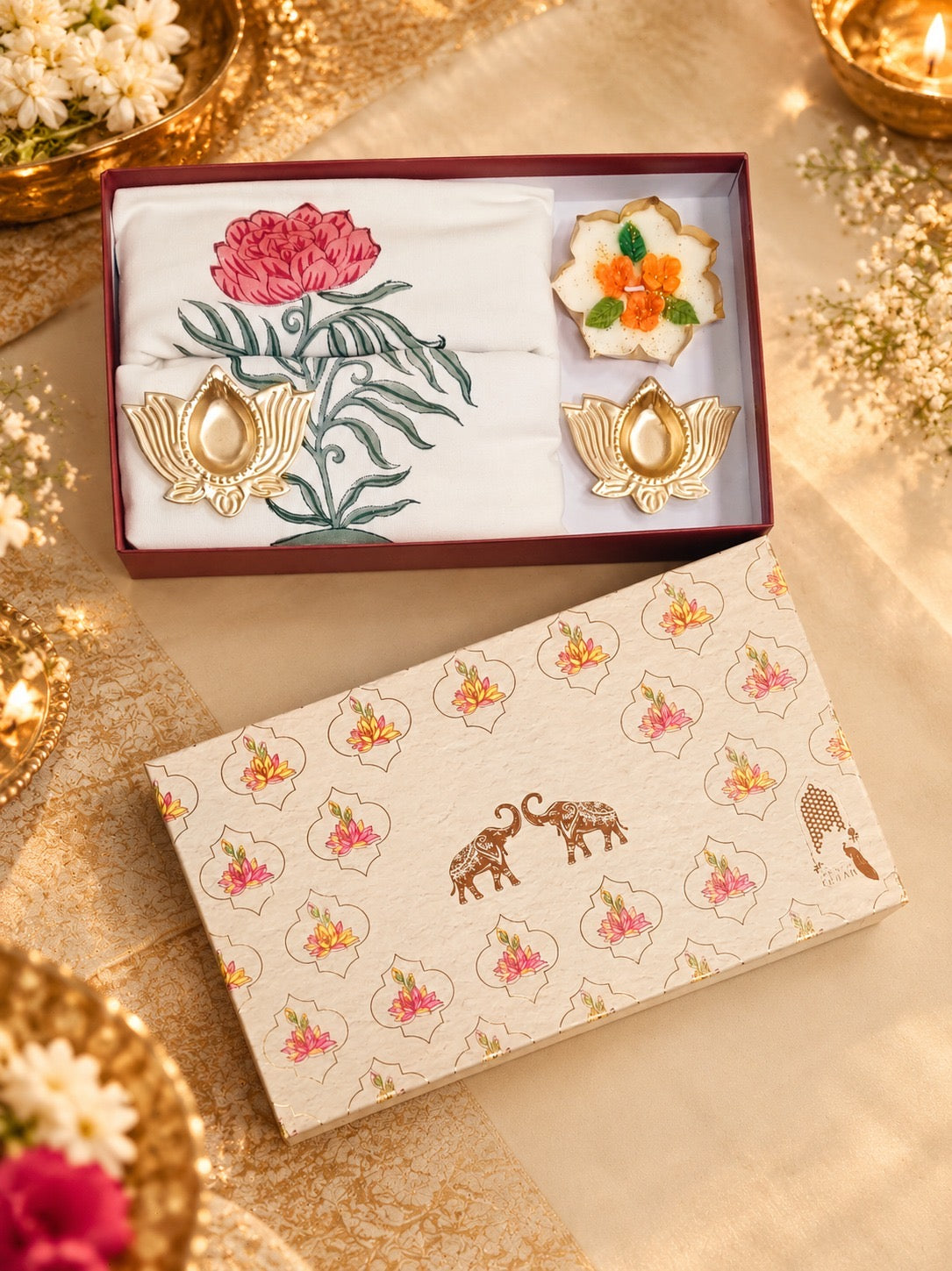 Diwali Home Décor Gift Box with 2 Cushion Covers, 1Handmade Floral Soy Wax Candle & 2 Metal Diyas