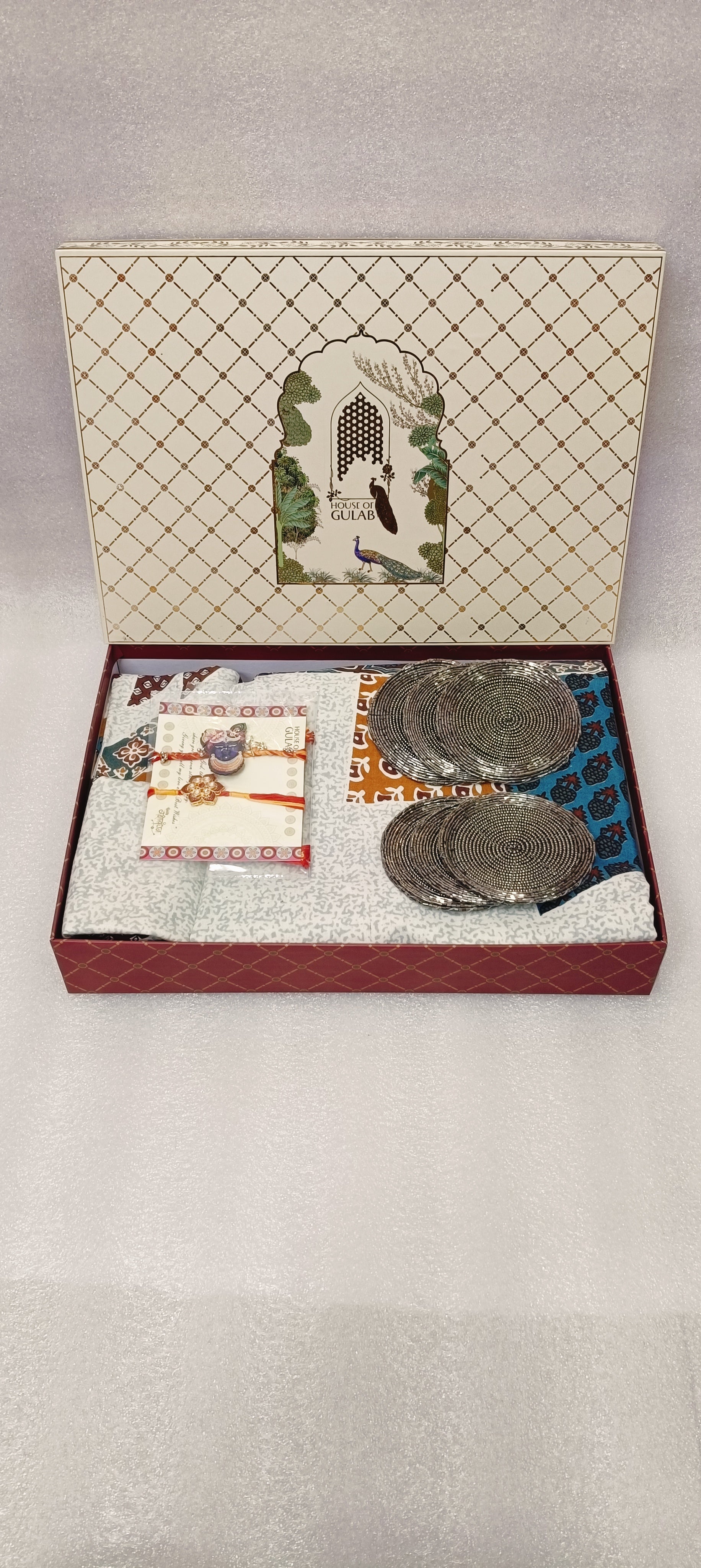 Rakhi Gift Box – Double Cotton Bedsheet, 2 Rakhi & 6 Beaded Coasters