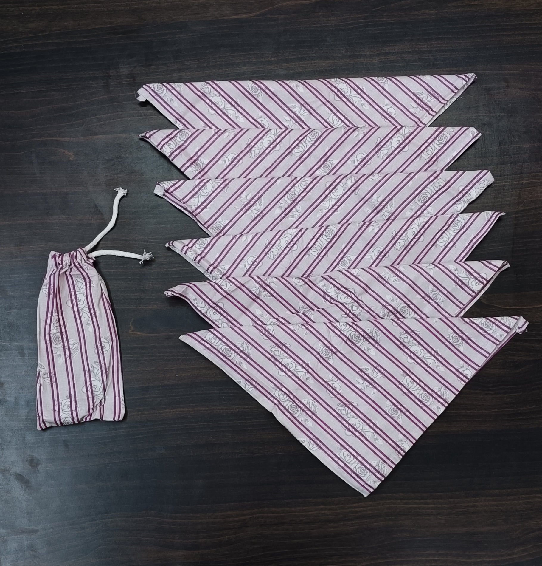 Drawstring bag with 6 hand block printed cotton table napkins
