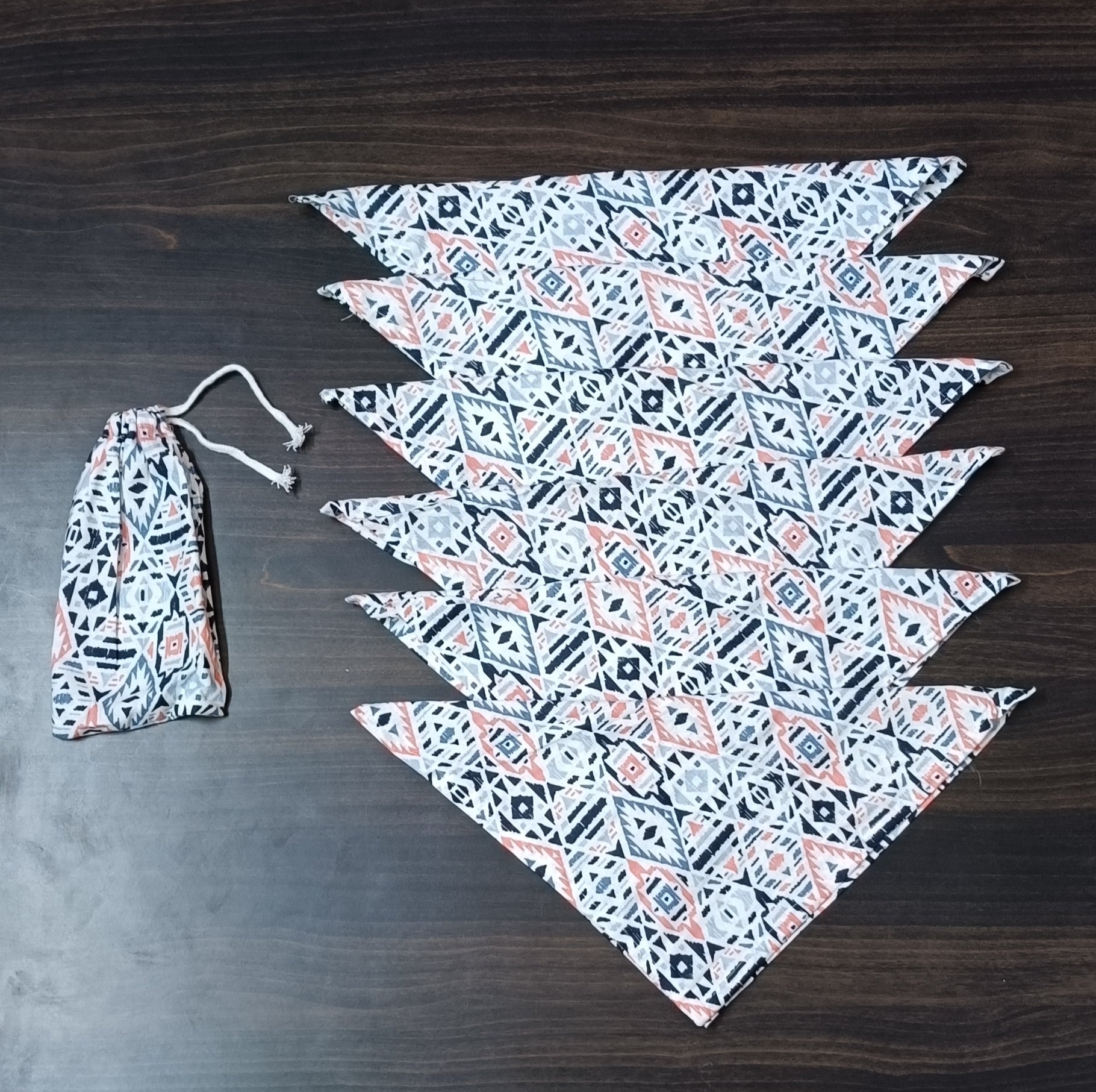 Drawstring bag with 6 hand block printed cotton table napkins