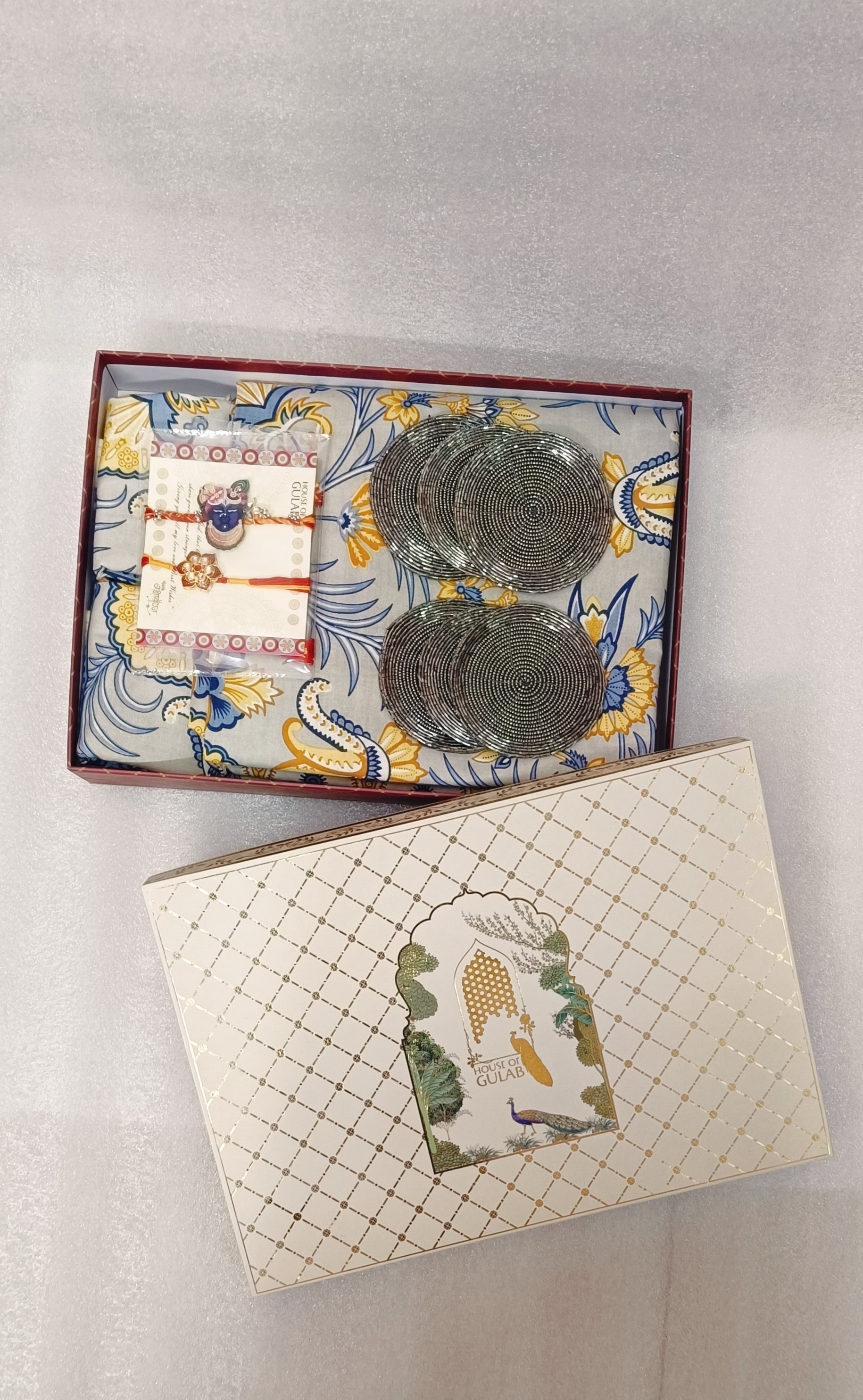 Rakhi Gift Box – Double Cotton Bedsheet, 2 Rakhi & 6 Beaded Coasters