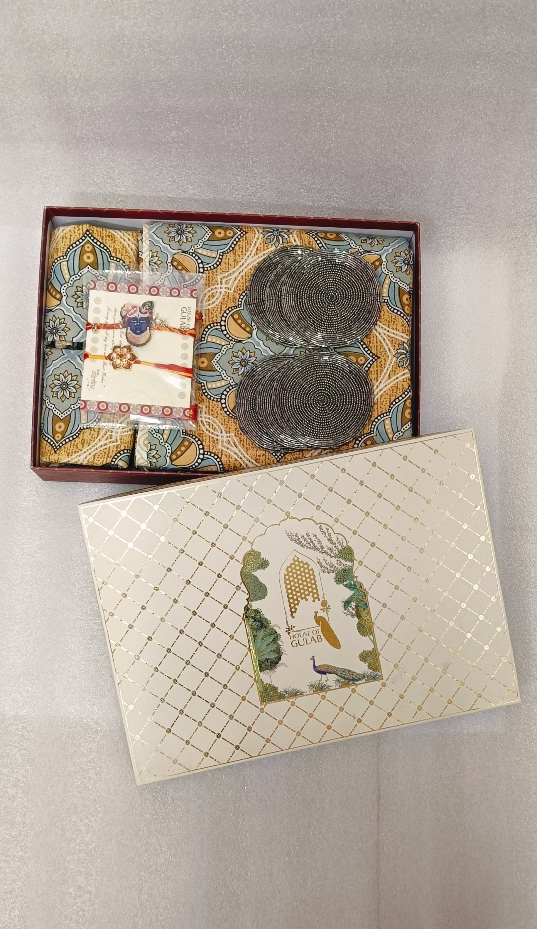 Rakhi Gift Box – Double Cotton Bedsheet, 2 Rakhi & 6 Beaded Coasters
