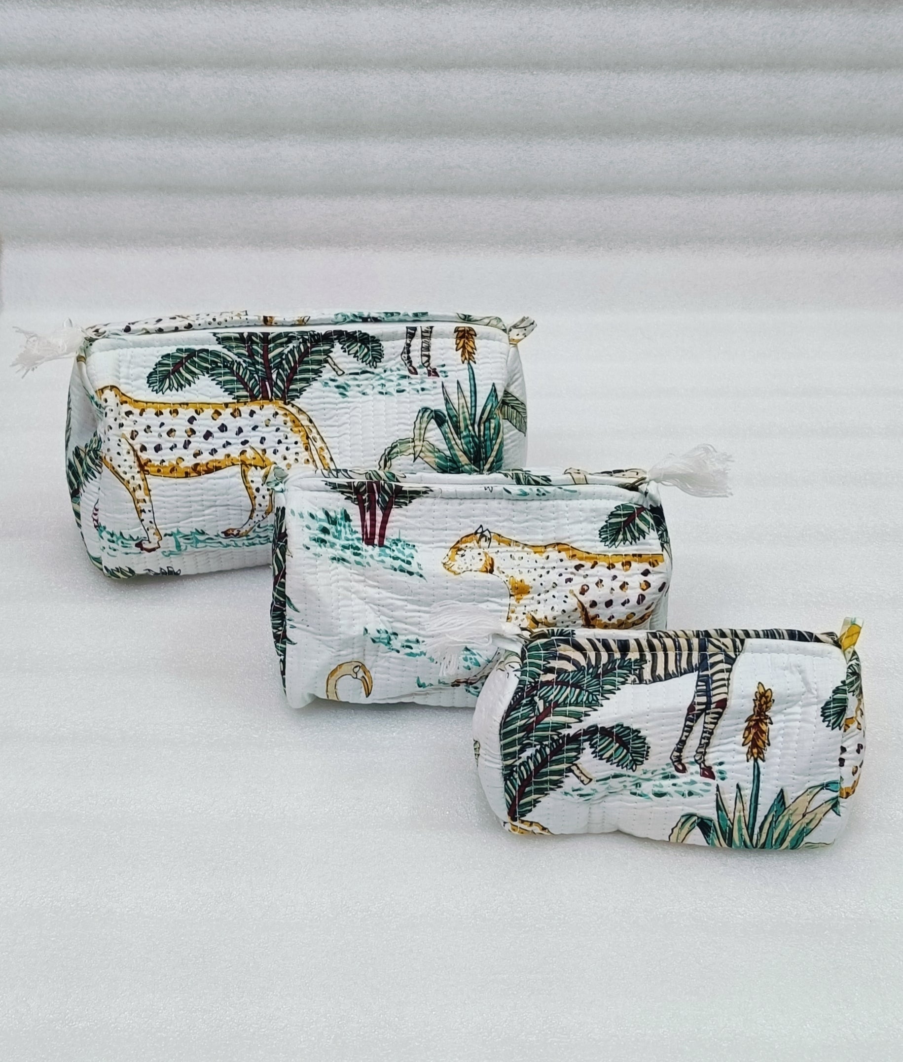 Set of 3 cosmetic bag/pouches with waterproof lining