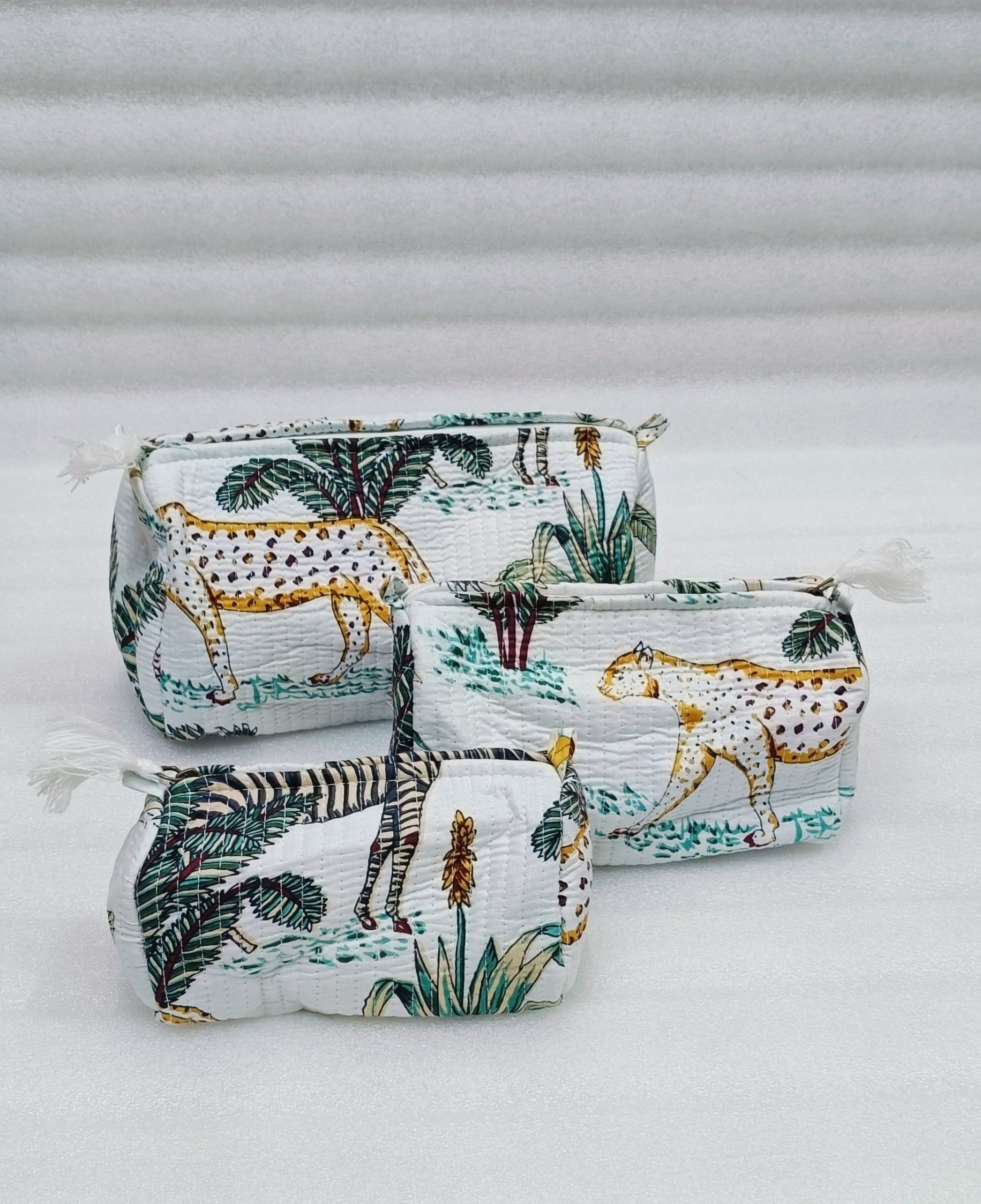 Set of 3 cosmetic bag/pouches with waterproof lining
