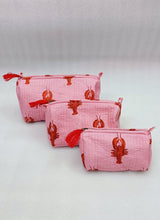 Set of 3 cosmetic bag/pouches with waterproof lining