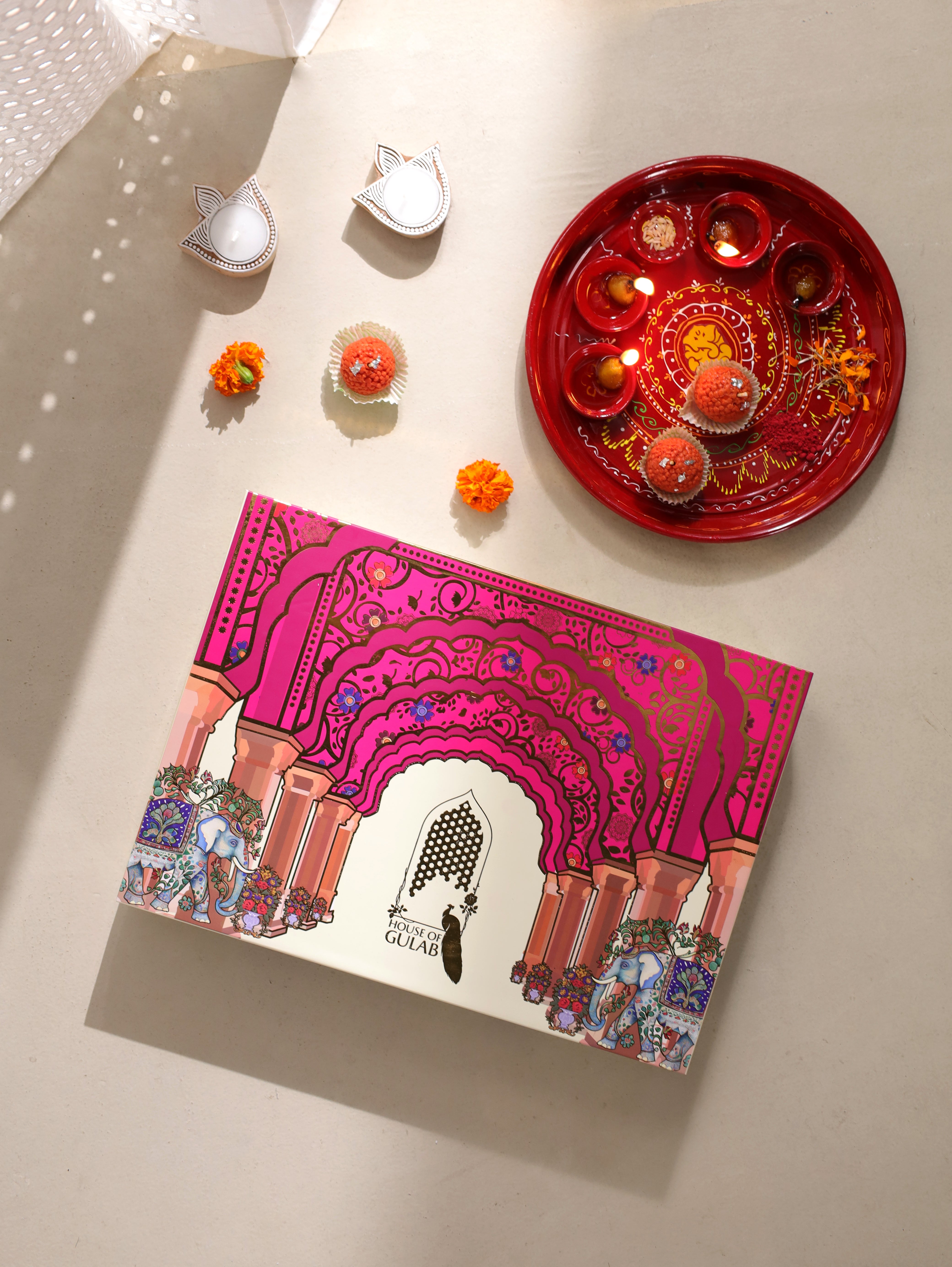 Diwali Gift Box | 1 Double Bedsheet, 1 Pair Door Hanging, 1 Metal Urli, 2 Laddoo Candles