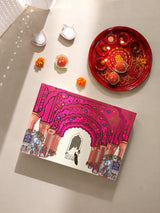 Diwali Gift Box | 1 Double Bedsheet, 1 Pair Door Hanging, 1 Metal Urli, 2 Laddoo Candles