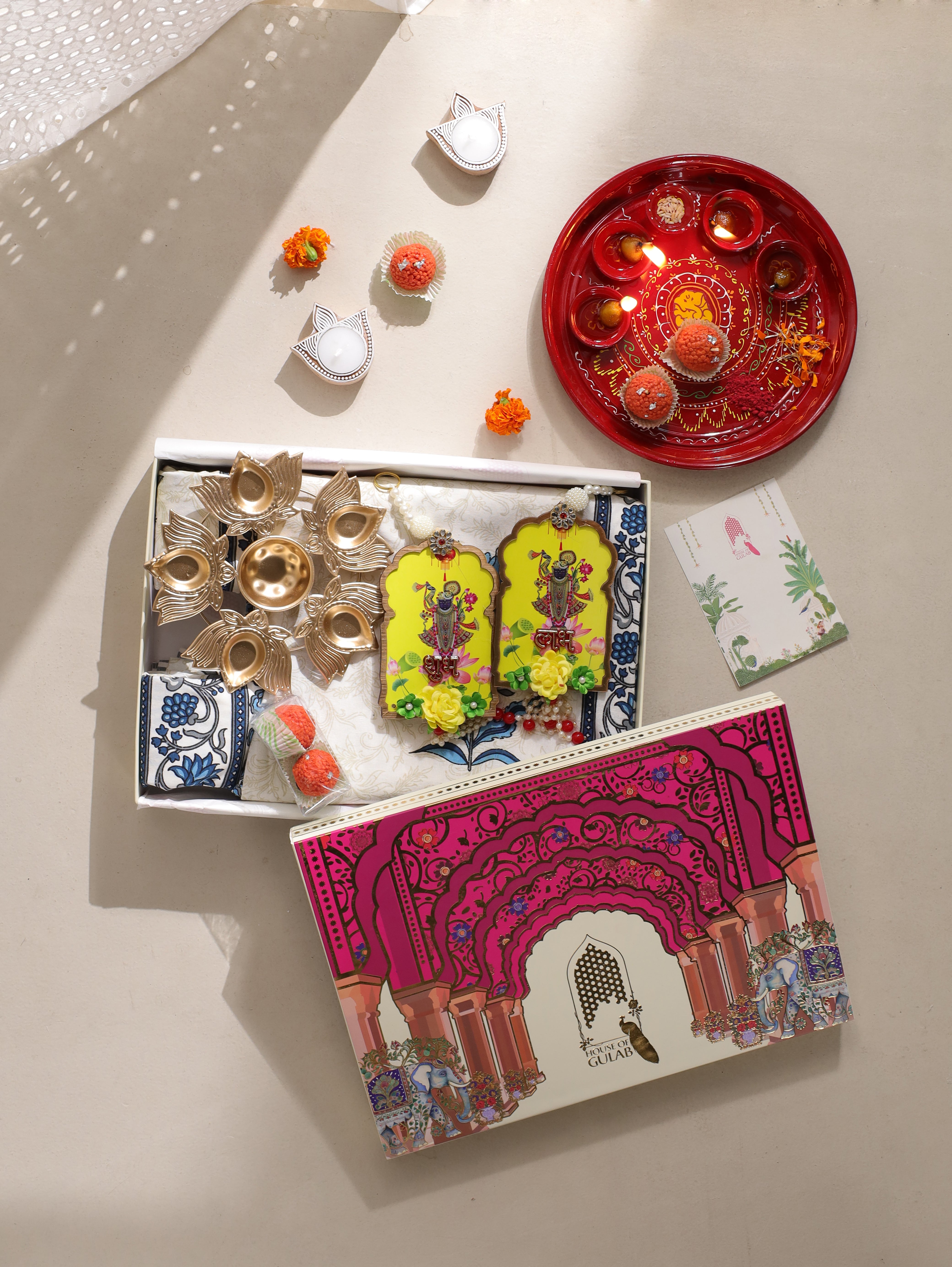 Diwali Gift Box | 1 Double Bedsheet, 1 Pair Door Hanging, 1 Metal Urli, 2 Laddoo Candles