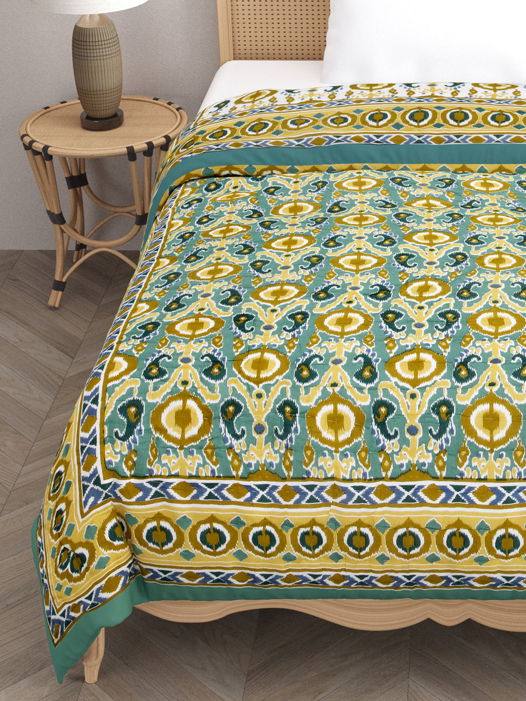 Ikat Printed Reversible Single Bed Cotton Quilt with cotton filling