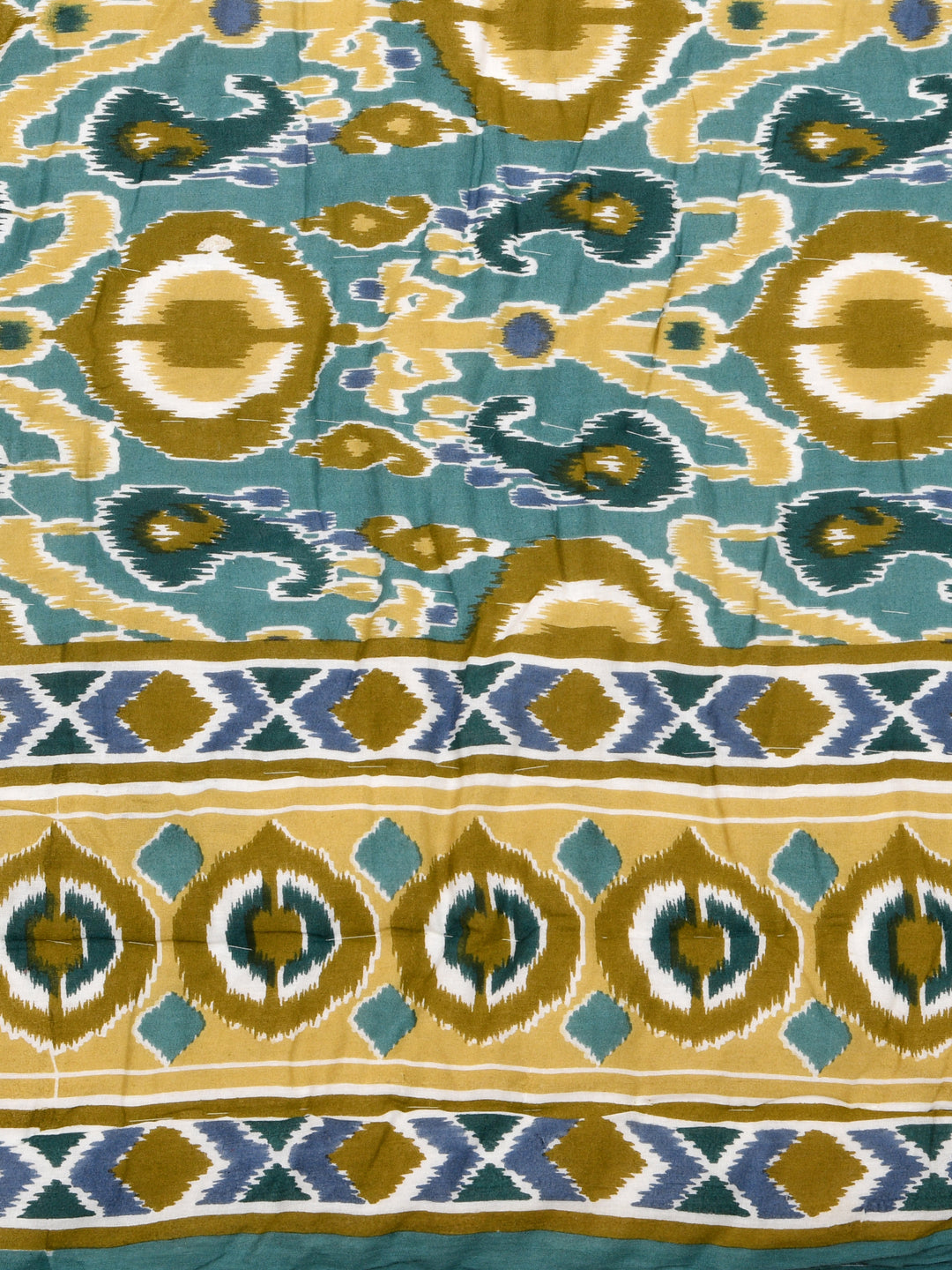 Ikat Printed Reversible Single Bed Cotton Quilt with cotton filling