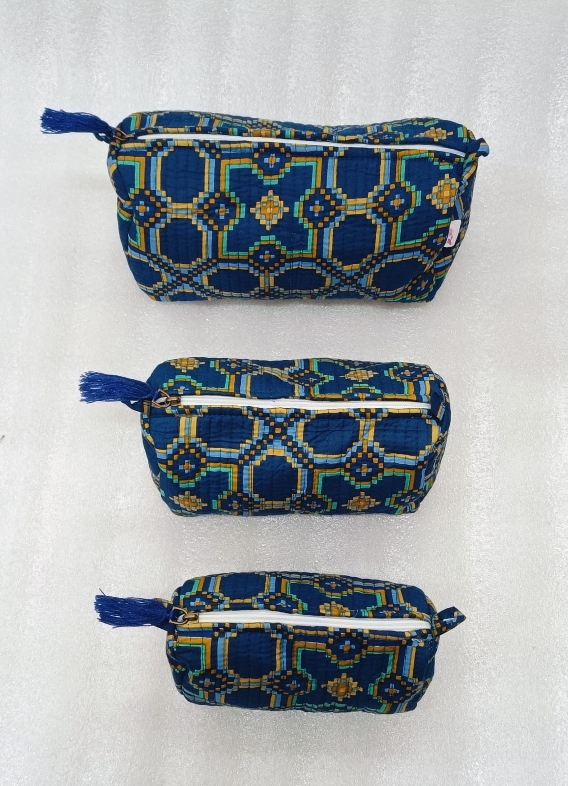 Set of 3 cosmetic bag/pouches with waterproof lining