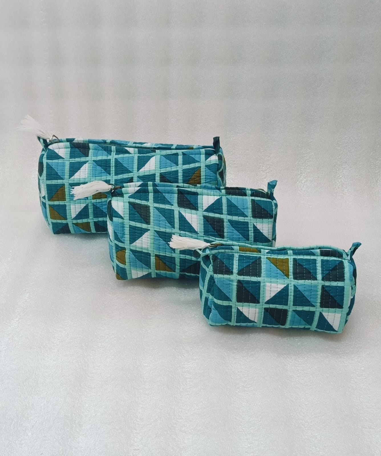 Set of 3 cosmetic bag/pouches with waterproof lining