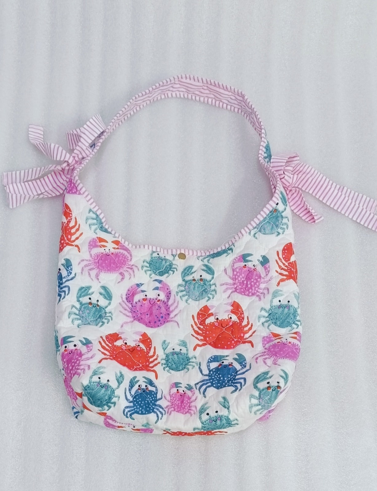Quilted Handblock printed Slouch Shoulder Bag with bow