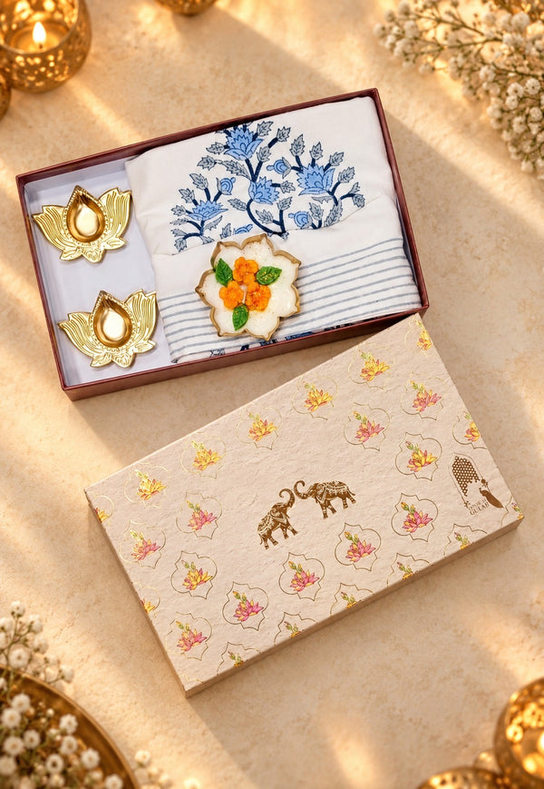 Diwali Home Décor Gift Box with 2 Cushion Covers, 1Handmade Floral Soy Wax Candle & 2 Metal Diyas