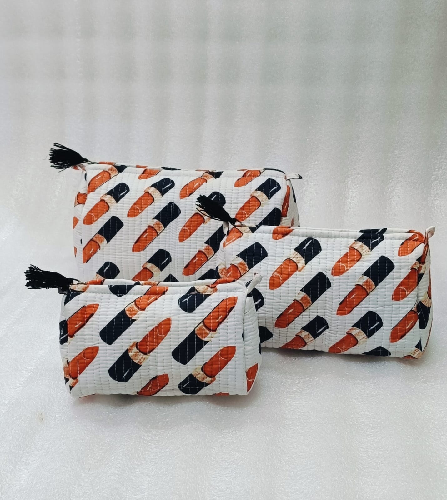 Set of 3 cosmetic bag/pouches with waterproof lining