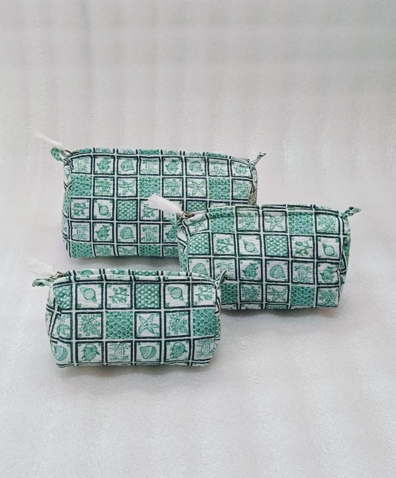 Set of 3 cosmetic bag/pouches with waterproof lining