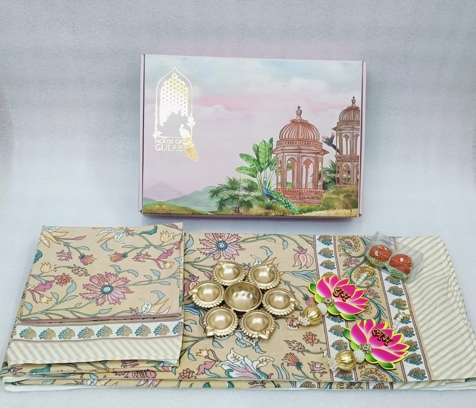 Diwali Gift Box | 1 Double Bedsheet, 1 Pair Door Hanging, 1 Metal Urli, 2 Laddoo Candles