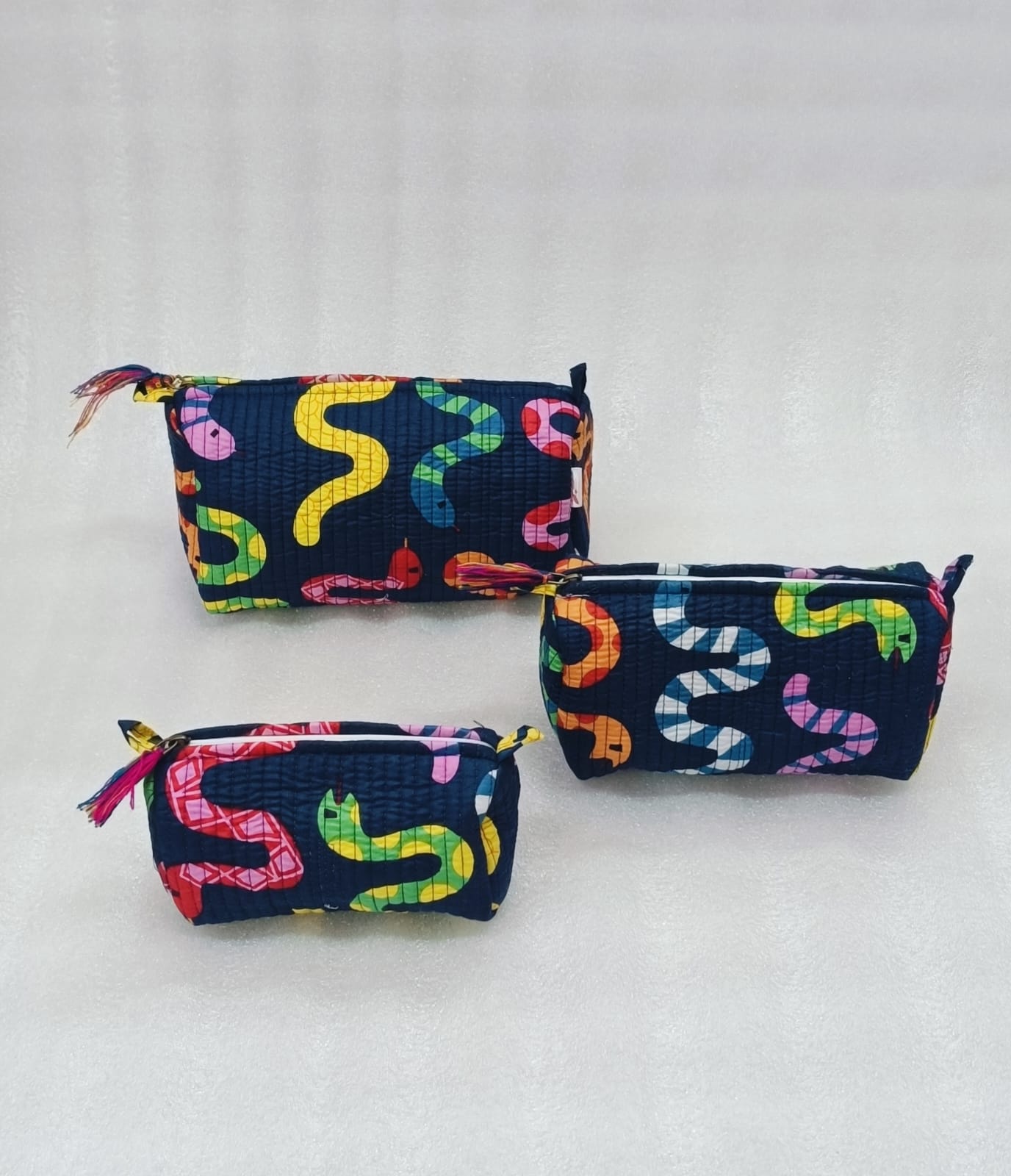 Set of 3 cosmetic bag/pouches with waterproof lining