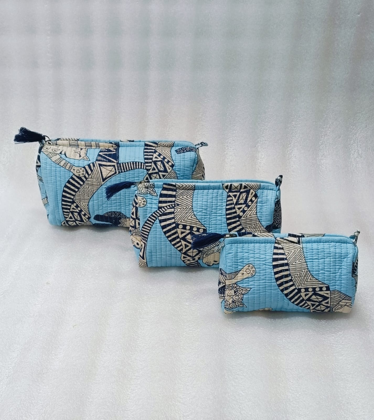 Set of 3 cosmetic bag/pouches with waterproof lining