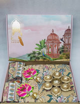 Diwali Gift Box | 1 Double Bedsheet, 1 Pair Door Hanging, 1 Metal Urli, 2 Laddoo Candles