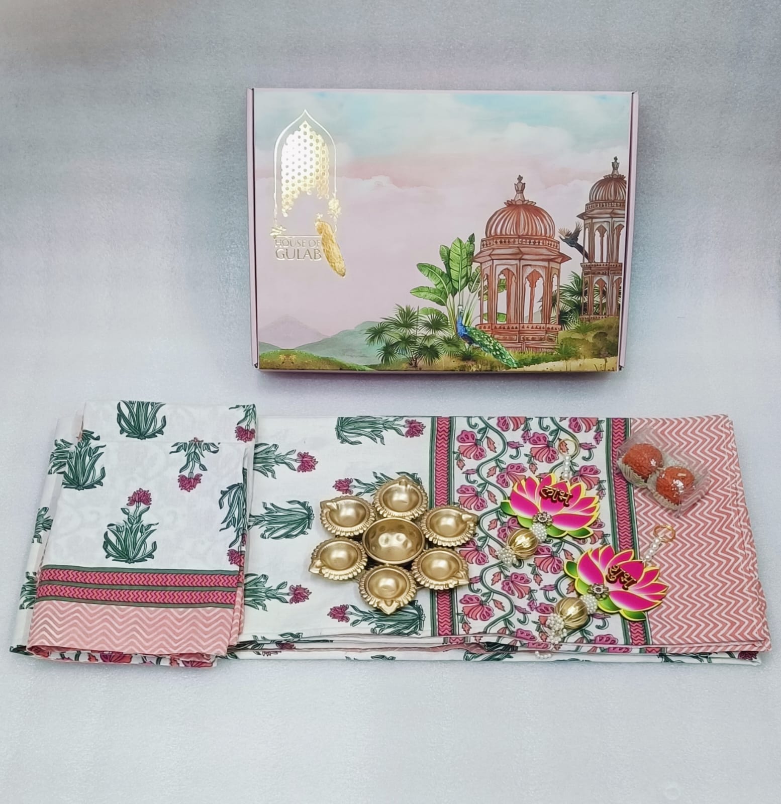 Diwali Gift Box | 1 Double Bedsheet, 1 Pair Door Hanging, 1 Metal Urli, 2 Laddoo Candles